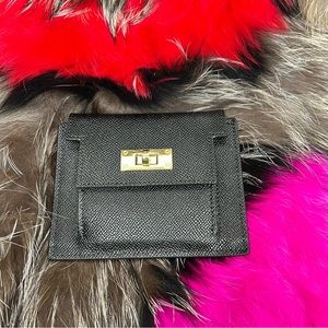 Black Genuine Epsom Leather Coin Purse Compact Card Holder with Gold hardware.